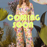 Pants with all-over print "Flora & Marble"
