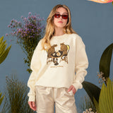 Sweater with "Secret Garden" print