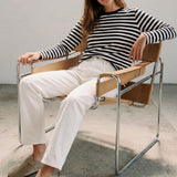Tops ar melnām un baltām strīpām